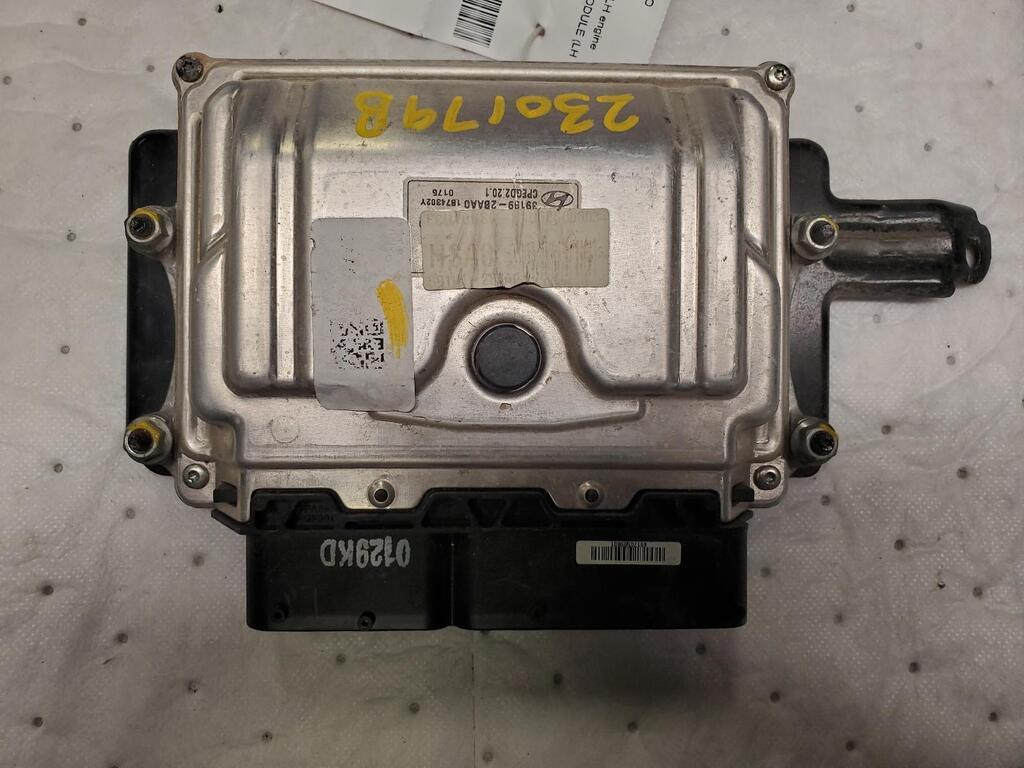 Used OEM engine control module (ECM) with its factory part number label